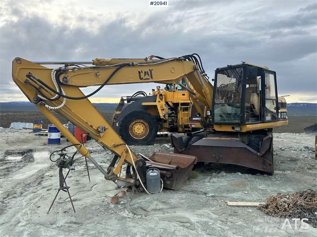 CAT 312 Bagri na kolesih