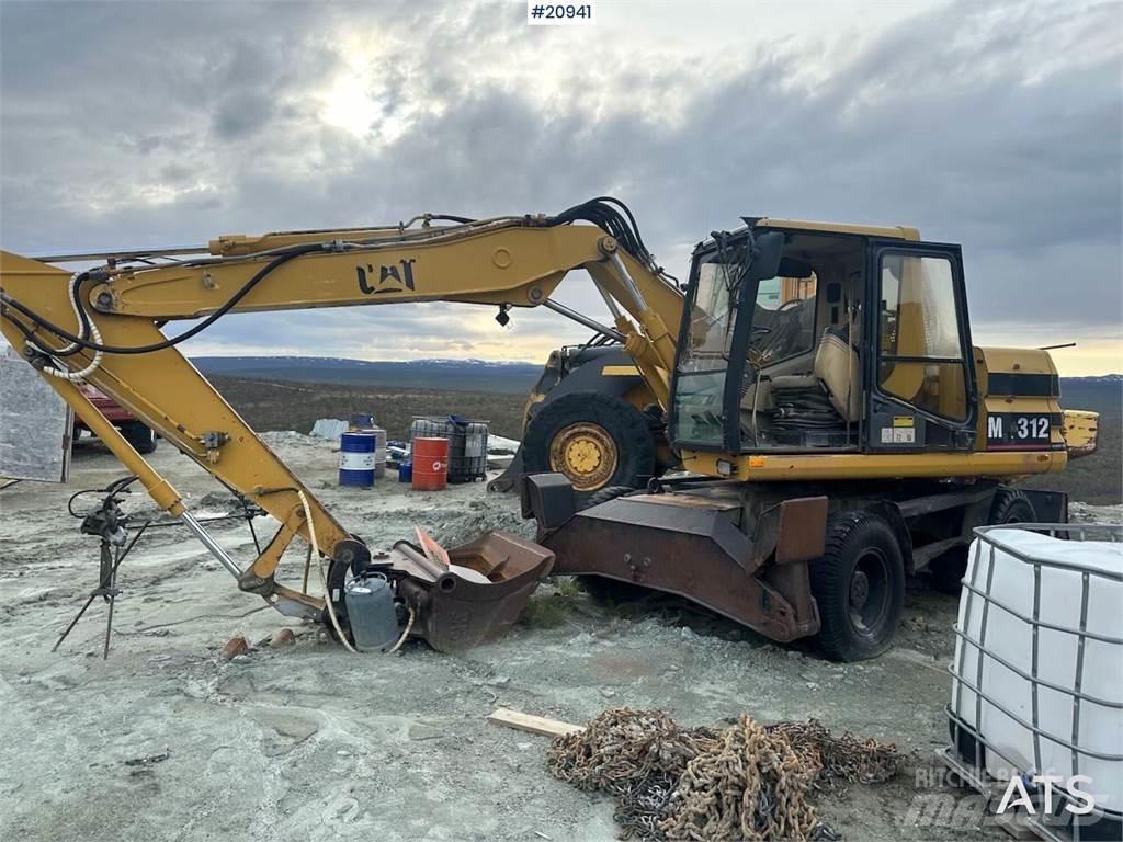 CAT 312 Bagri na kolesih