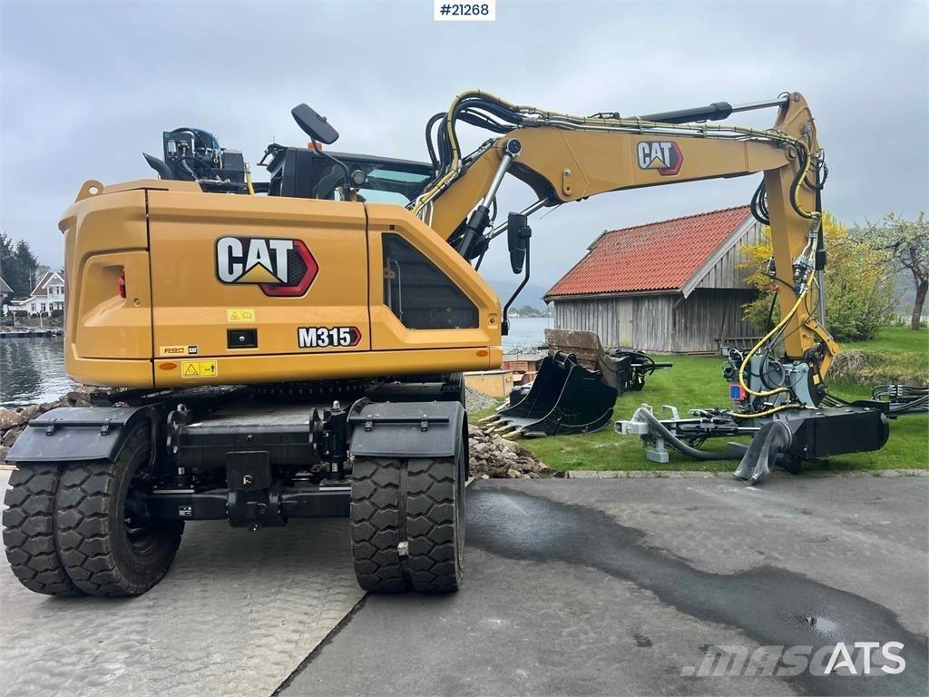 CAT M315 Bagri na kolesih