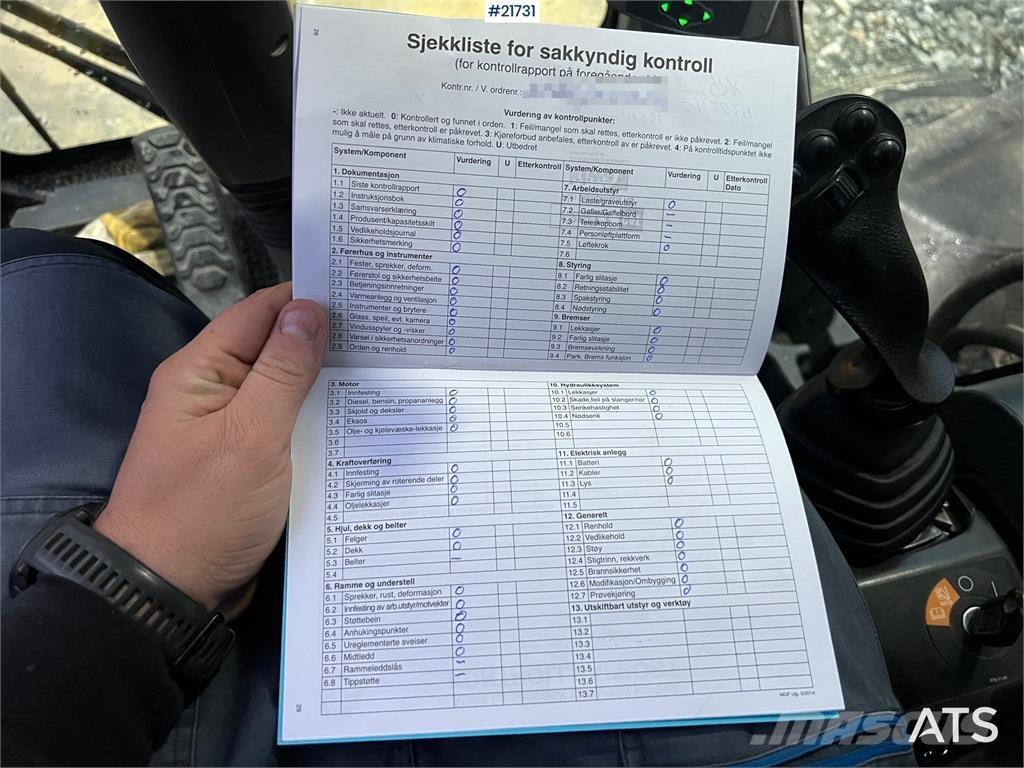 CAT M318F Bagri na kolesih