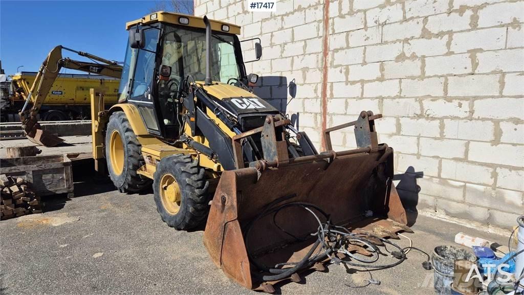 CAT 428D Rovokopači