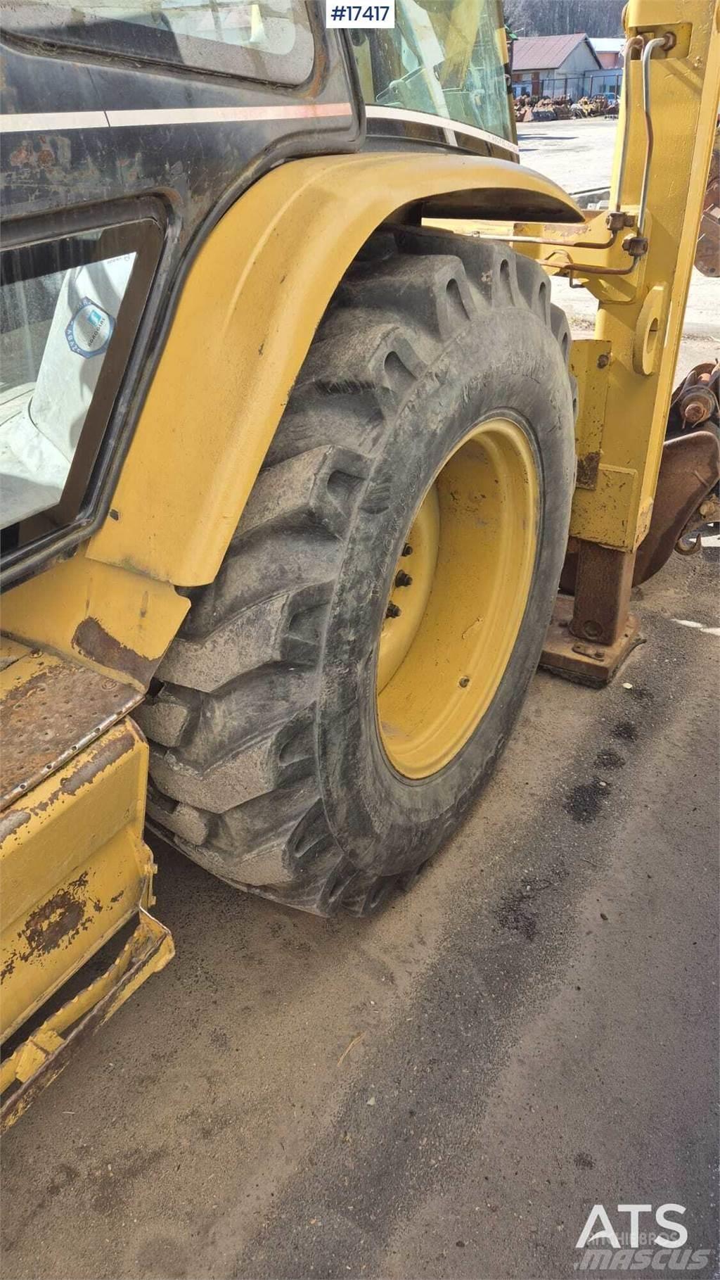 CAT 428D Rovokopači