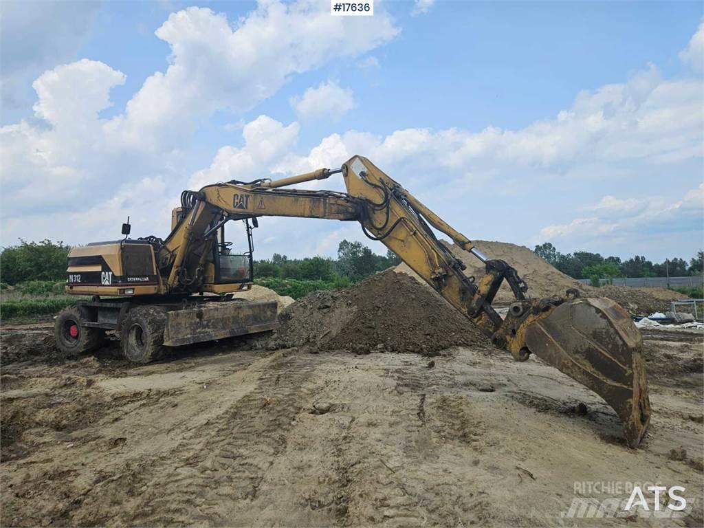CAT M312 Bagri na kolesih