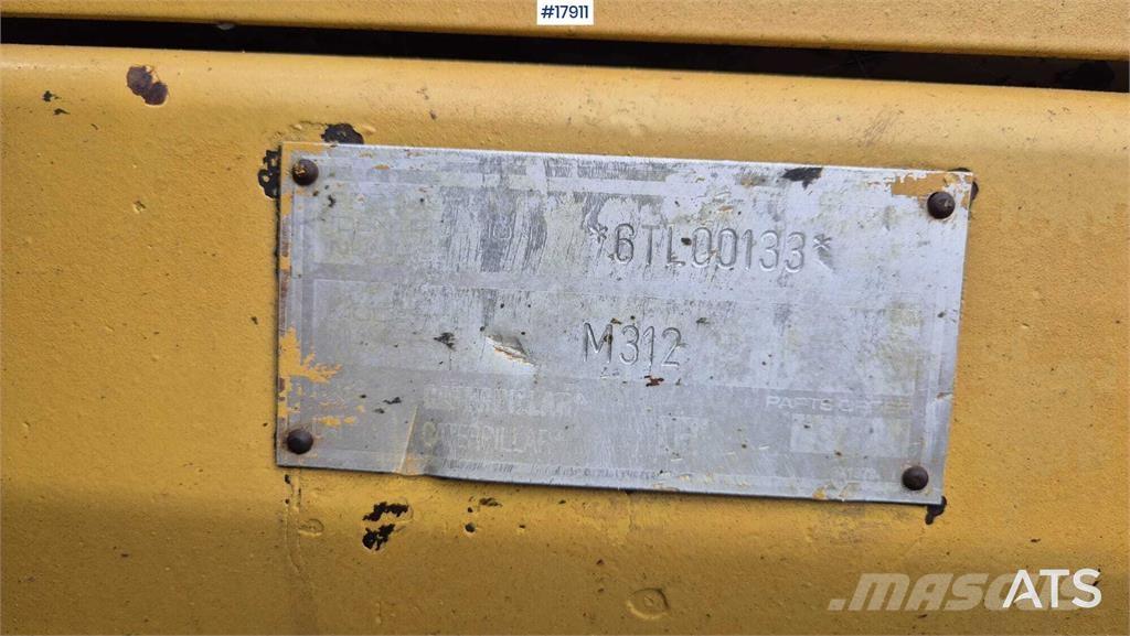 CAT M312 Bagri na kolesih