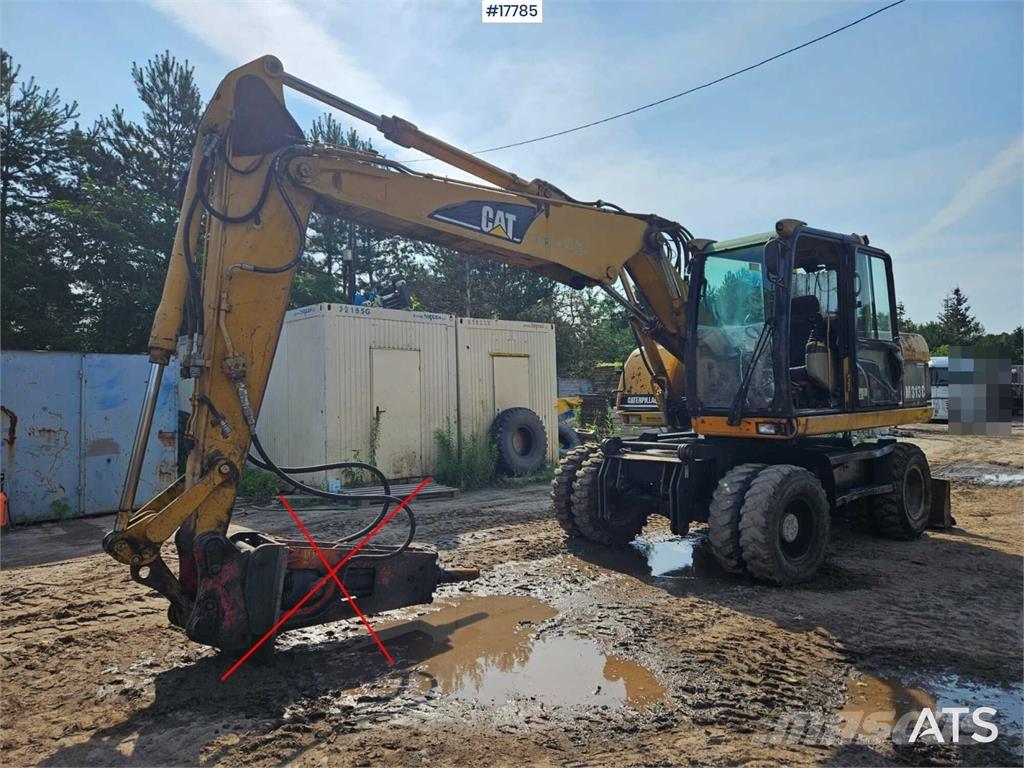 CAT M313 C Bagri na kolesih