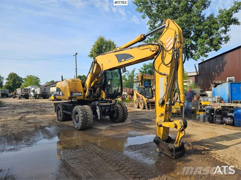 CAT M315C Bagri na kolesih