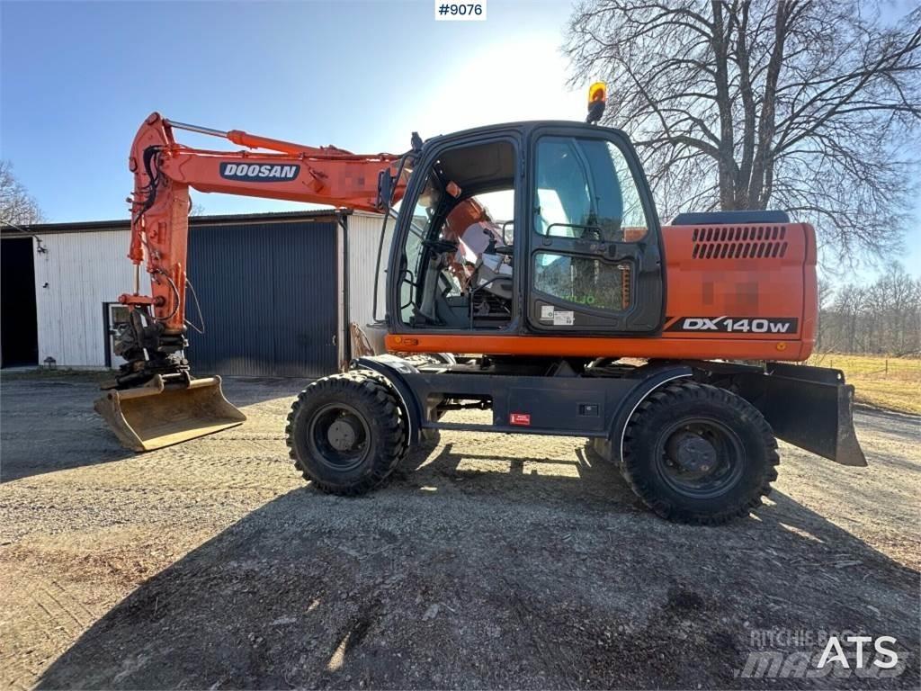 Doosan DX140W Bagri na kolesih