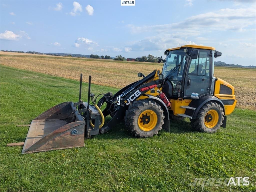 JCB 409 Kolesni nakladalci