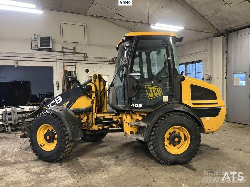 JCB 409 T4 Kolesni Buldožerji