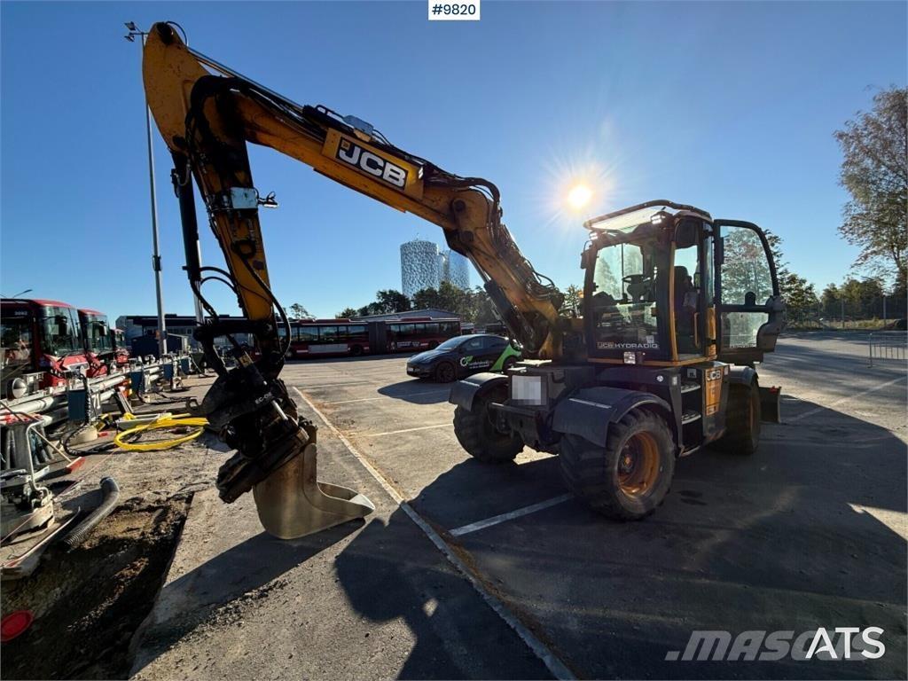 JCB Hydradig 110W Bagri na kolesih