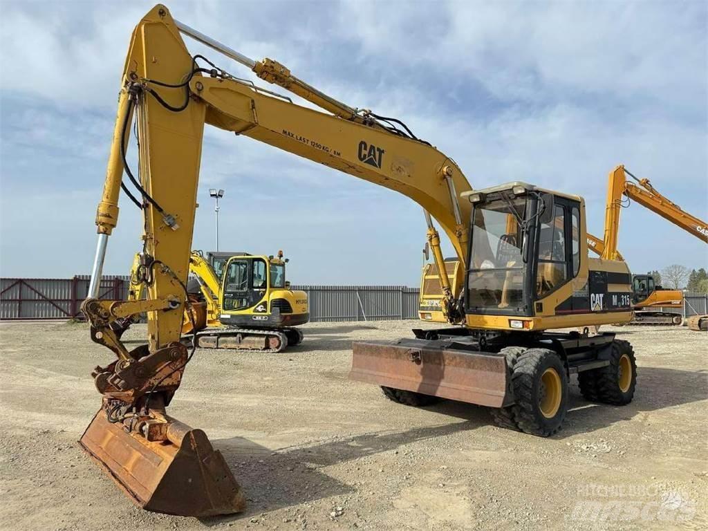 CAT M 315 Bagri na kolesih