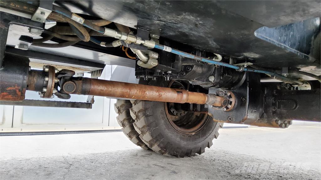 CAT M318-07E Bagri na kolesih