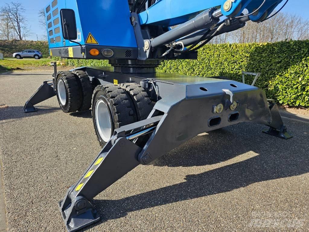 Fuchs MHL 320 Bagri za prekladanje primarnih/sekundarnih surovin