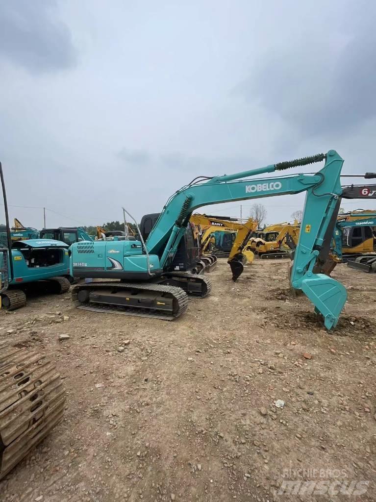 Kobelco SK140 Bagri goseničarji
