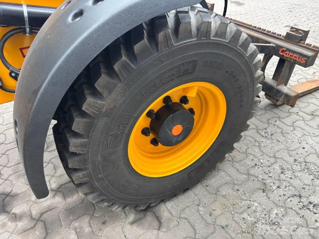 JCB 409 Kolesni nakladalci