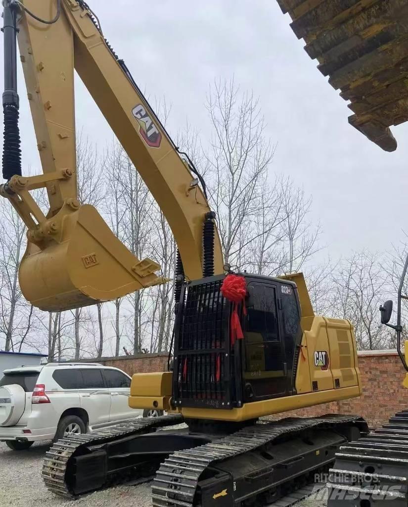 CAT 323 Bagri goseničarji
