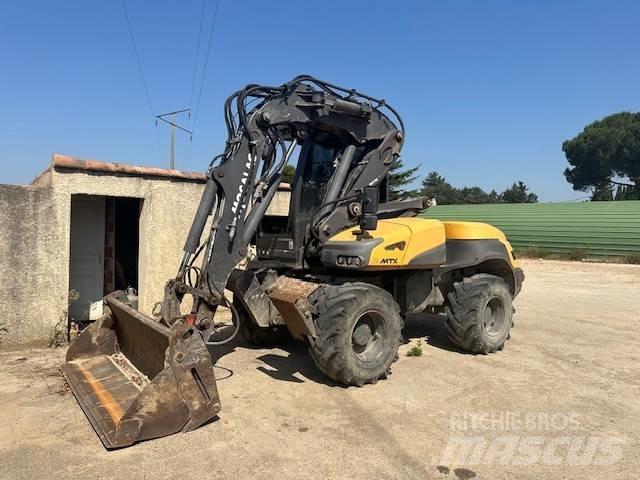 Mecalac 12 MTX Bagri na kolesih