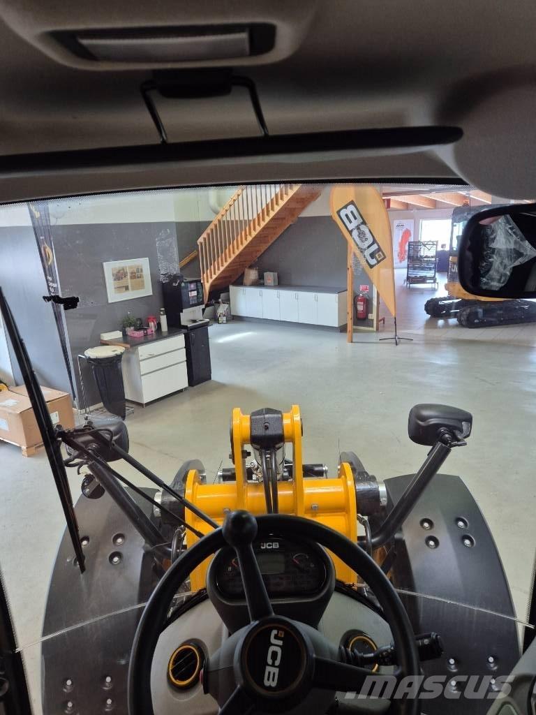 JCB 409 Kolesni nakladalci