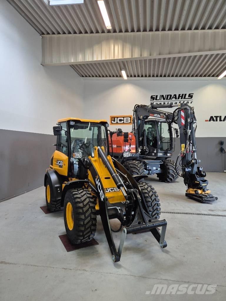 JCB 409 Kolesni nakladalci