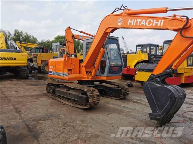 Hitachi EX60 Bagri goseničarji