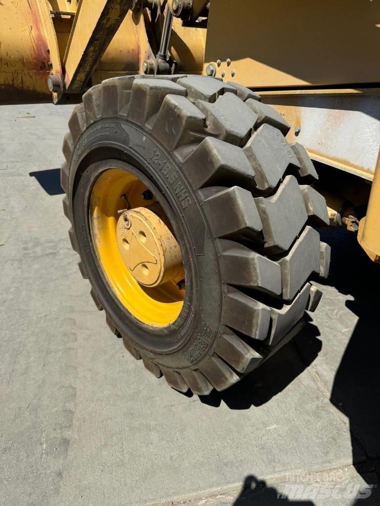 John Deere 310 G Rovokopači