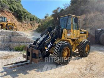 CAT IT 18 B Kolesni nakladalci