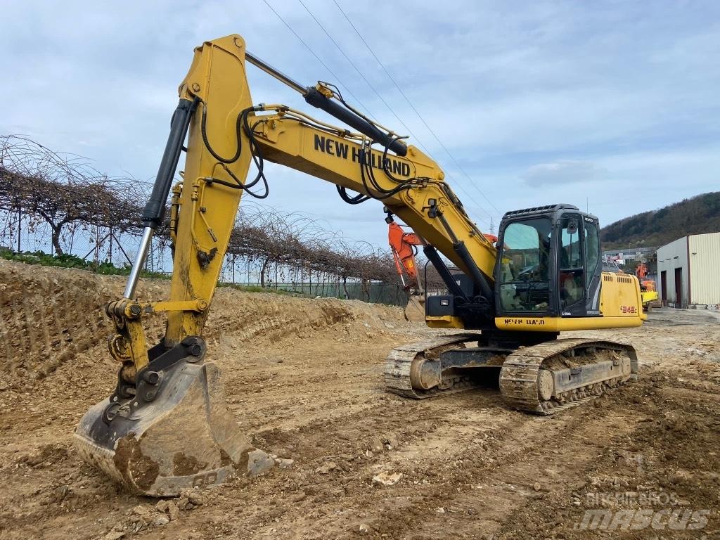 New Holland E245 Bagri goseničarji