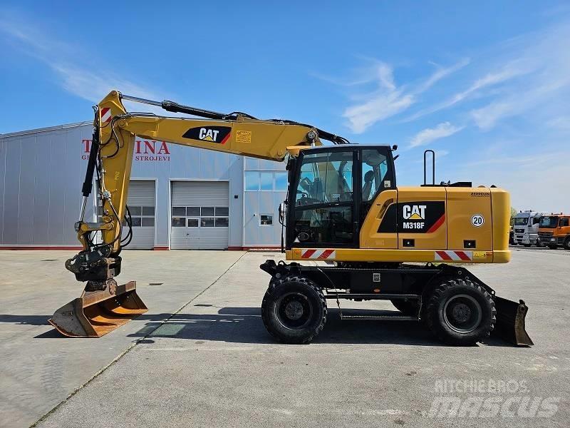 CAT M 318 F Bagri na kolesih