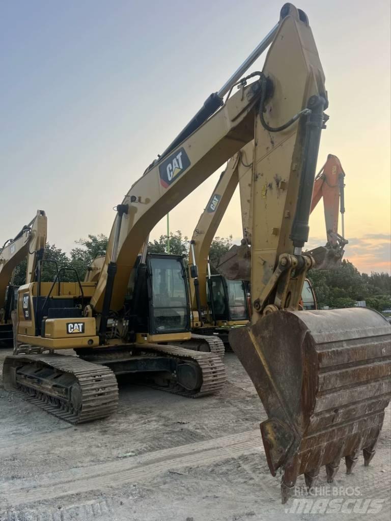 CAT 323 GC Bagri goseničarji
