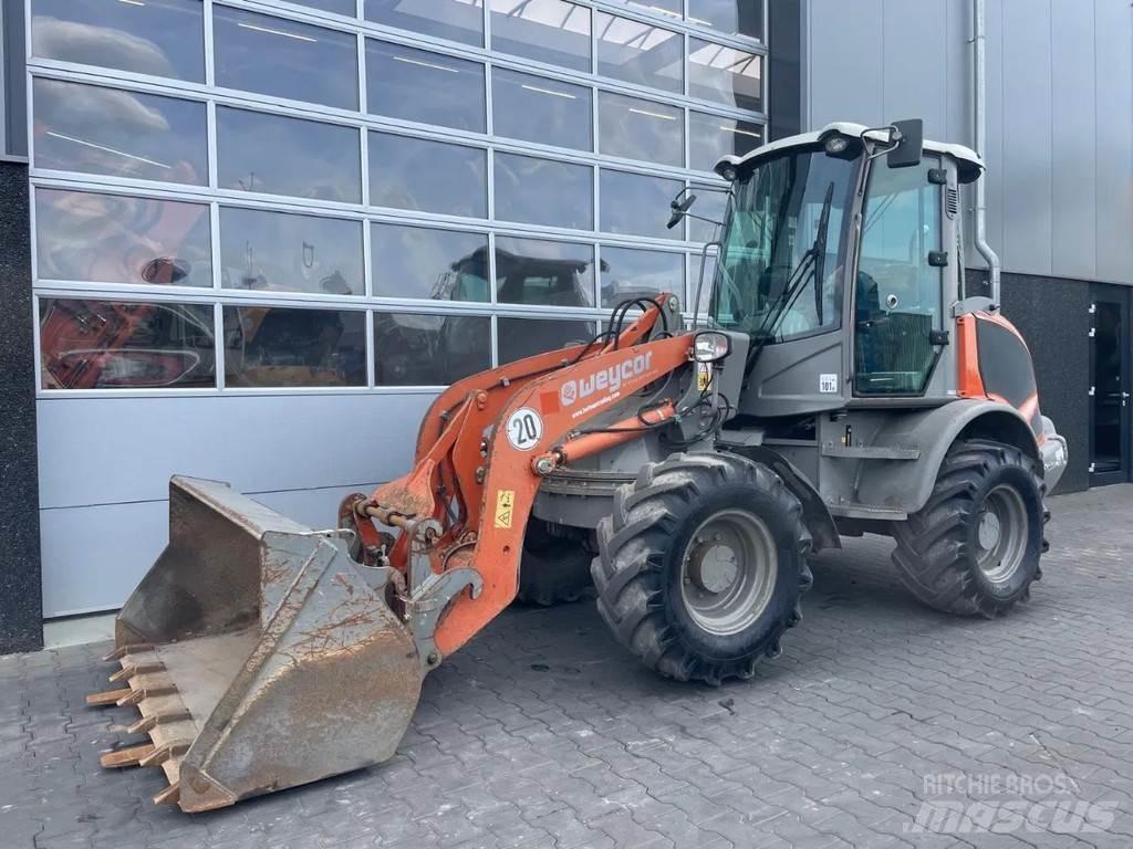 Atlas AR75e S Kolesni nakladalci