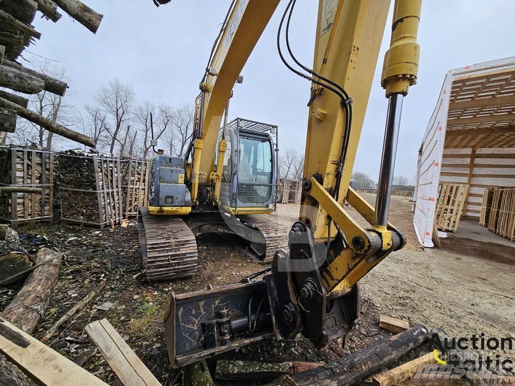 New Holland E 145 Bagri goseničarji