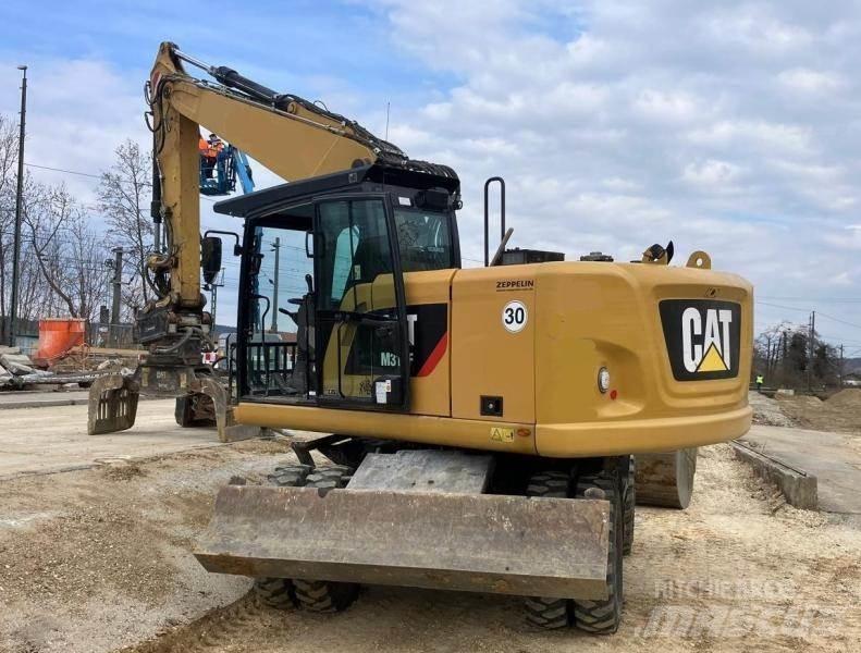 CAT M316F Bagri na kolesih