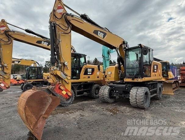 CAT M318F Bagri na kolesih
