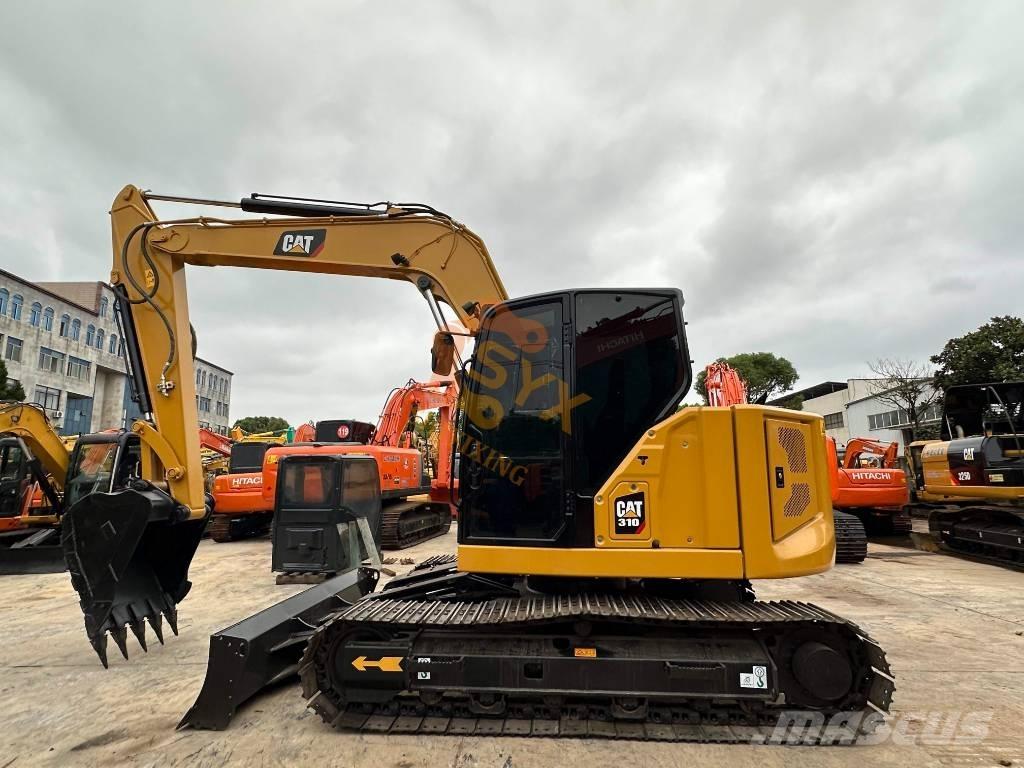 CAT 310 Bagri goseničarji