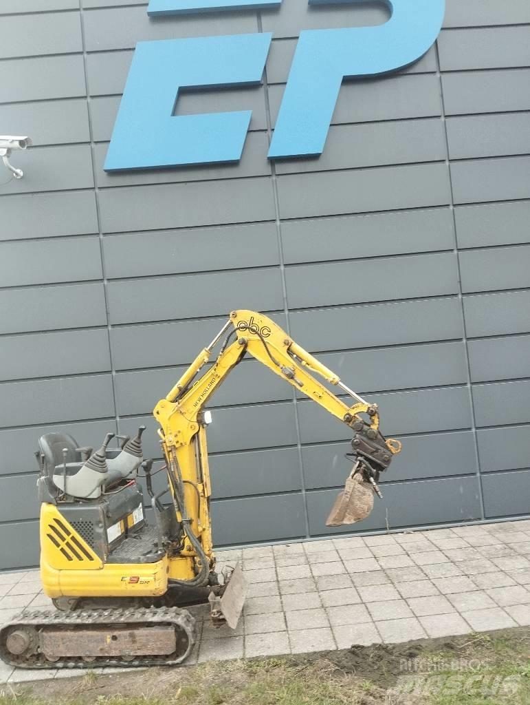 New Holland E 9 SR Mini bagri <7t