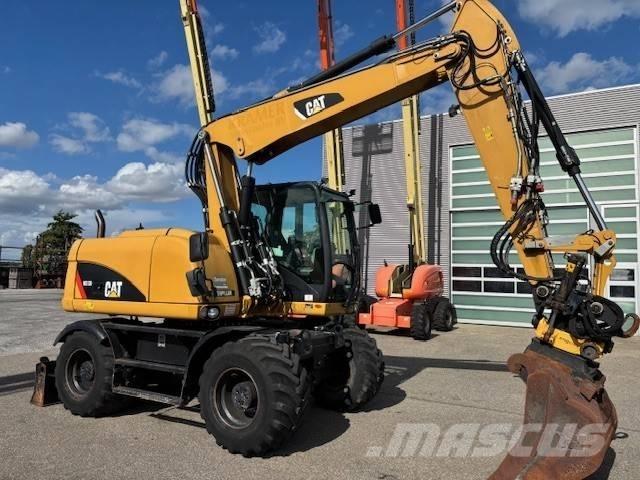 CAT M 313 D Bagri na kolesih