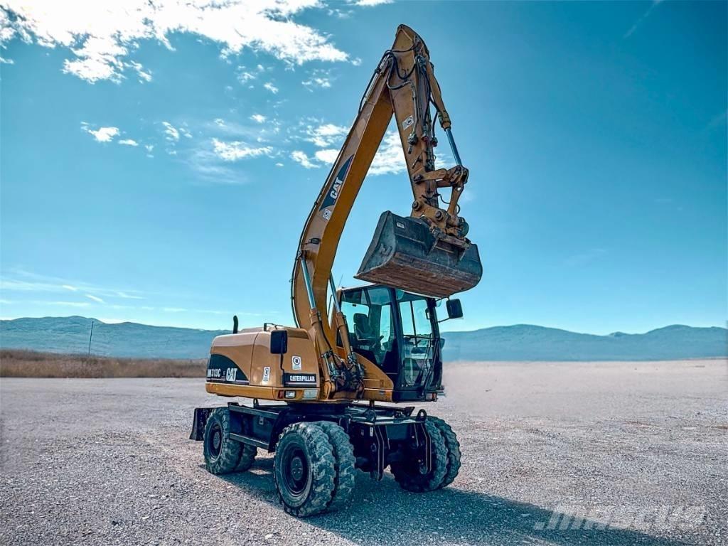 CAT M 313 C Bagri na kolesih