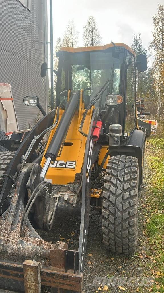 JCB 409 Kolesni nakladalci