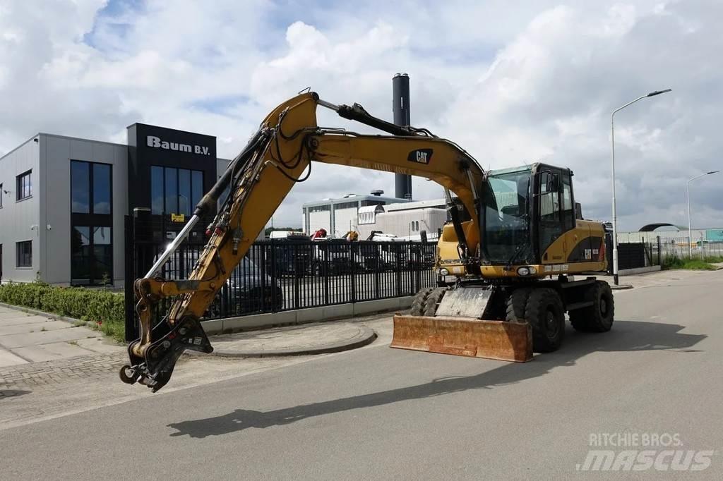 CAT M313 D Bagri na kolesih