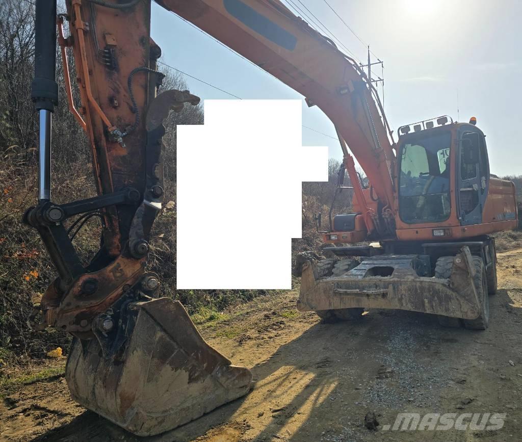 Doosan DX 210 W Bagri na kolesih