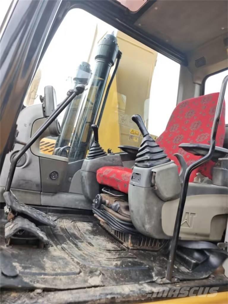 CAT 323 GC Bagri goseničarji