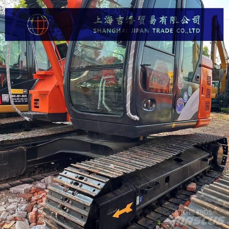 Hitachi ZX 135 Bagri goseničarji