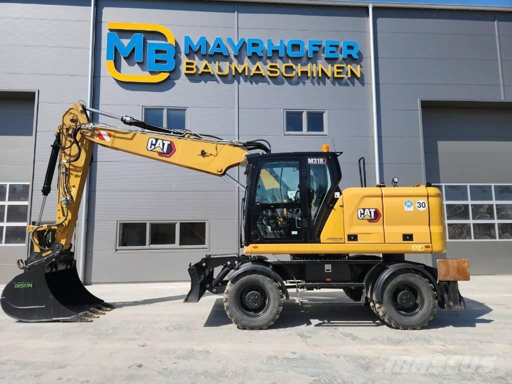 CAT M 318 Bagri na kolesih