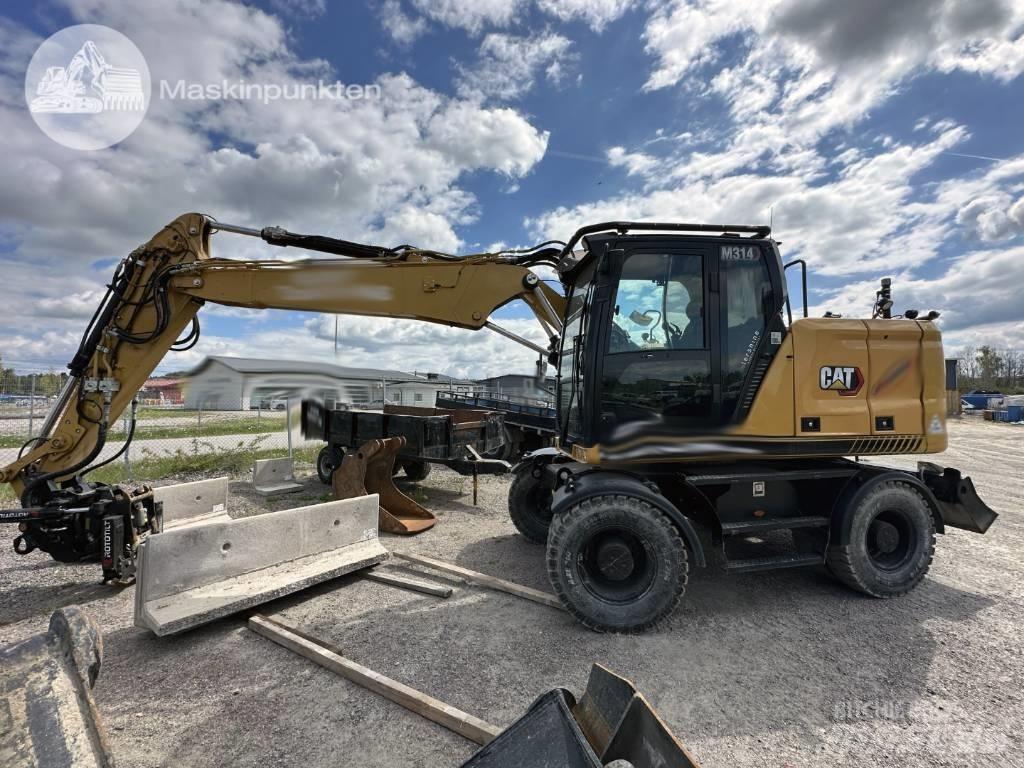 CAT M 314 Bagri na kolesih