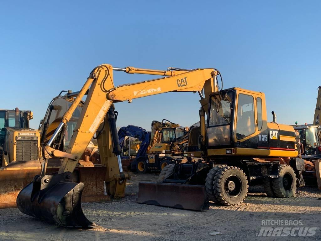 CAT M 315 Bagri na kolesih