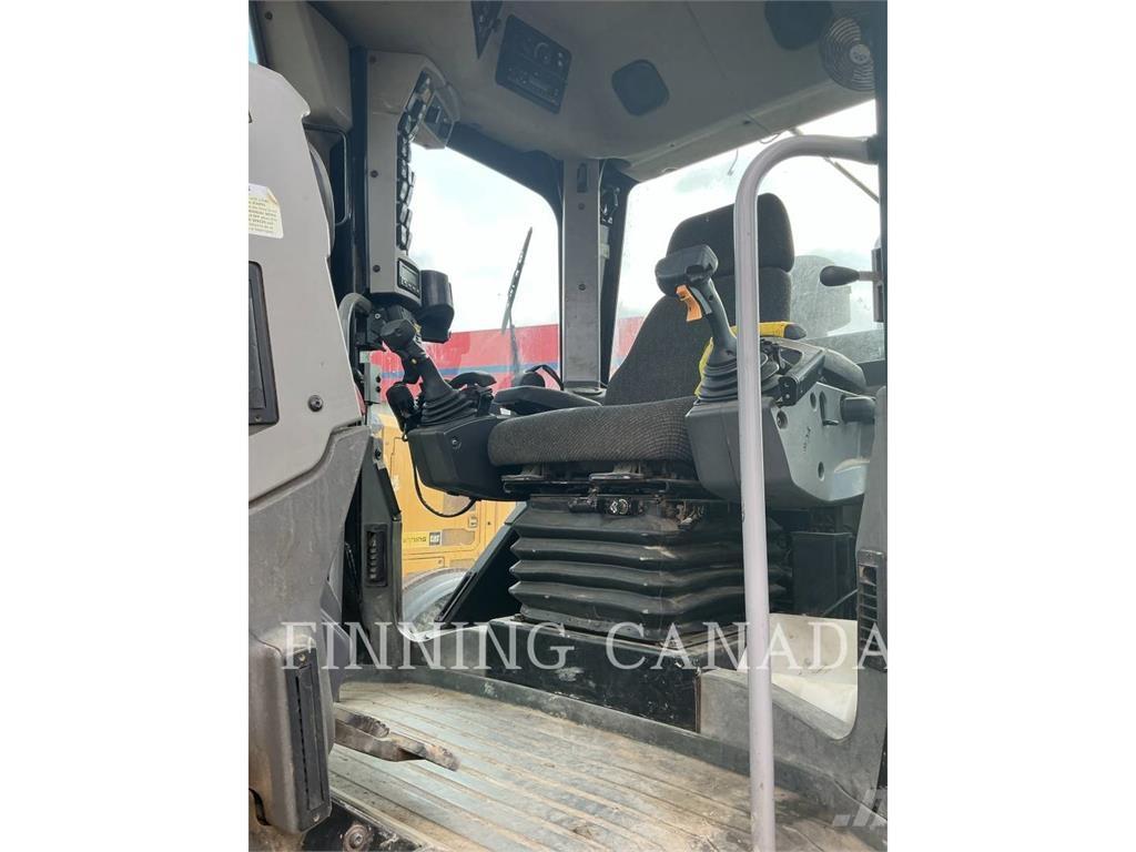 CAT 140M AWD Grederji