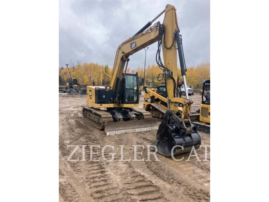 CAT 310 Bagri goseničarji