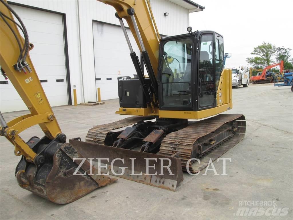 CAT 310 Bagri goseničarji