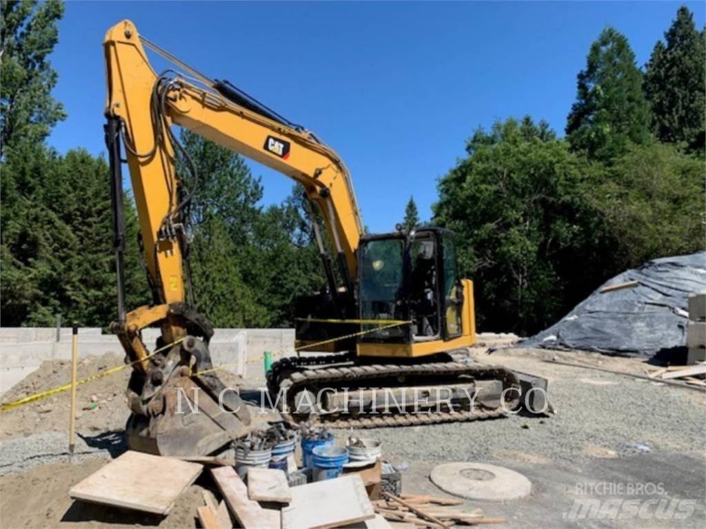 CAT 310 Bagri goseničarji