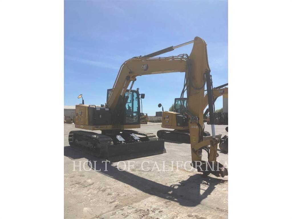 CAT 310 Bagri goseničarji